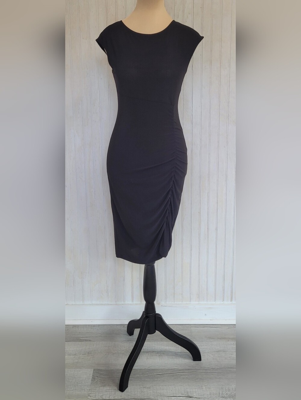 ​Bebe NWT Black Side Ruched Asymmetrical Hem Bodycon Midi Dress M
